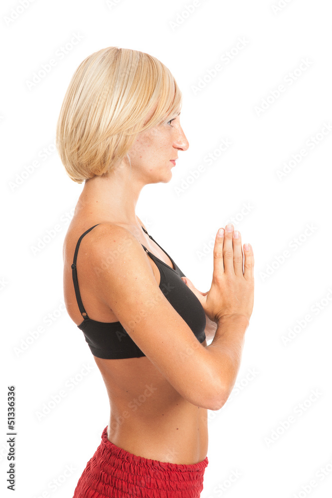 Practicing Yoga. Young woman isolated on white background Practicing Yoga. Young woman isolated on white background