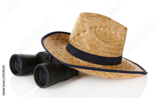 Black modern binoculars with straw hat isolated on white