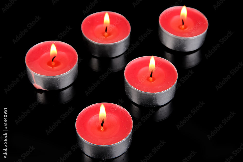 Candles isolated on black