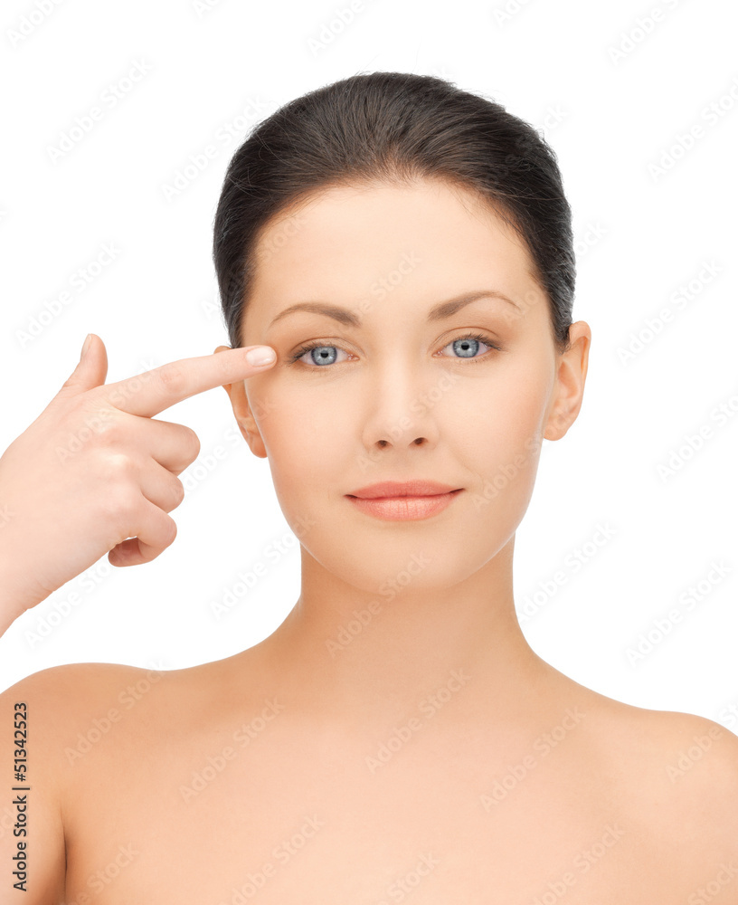 beautiful woman touching her eye area beautiful woman touching her eye area
