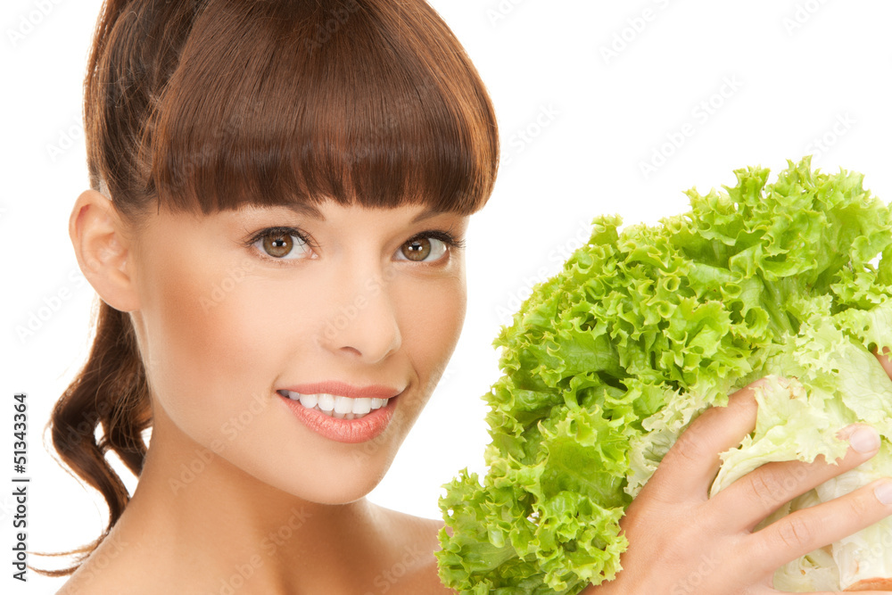 woman holding lettuce woman holding lettuce