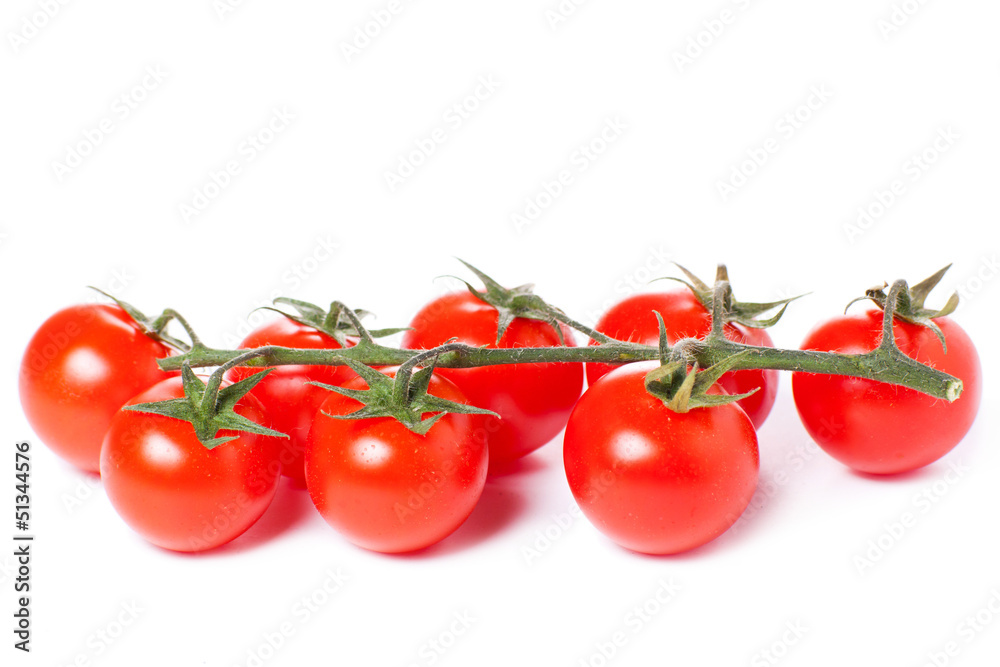 Juicy organic Cherry tomatoes isolated over white background Juicy organic Cherry tomatoes isolated over white background