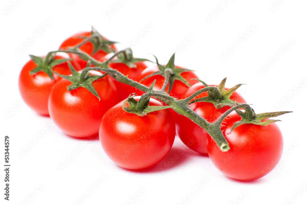 Juicy organic Cherry tomatoes isolated over white background Juicy organic Cherry tomatoes isolated over white background