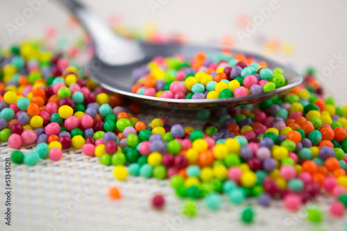 colorful sugar sprinkles in spoon