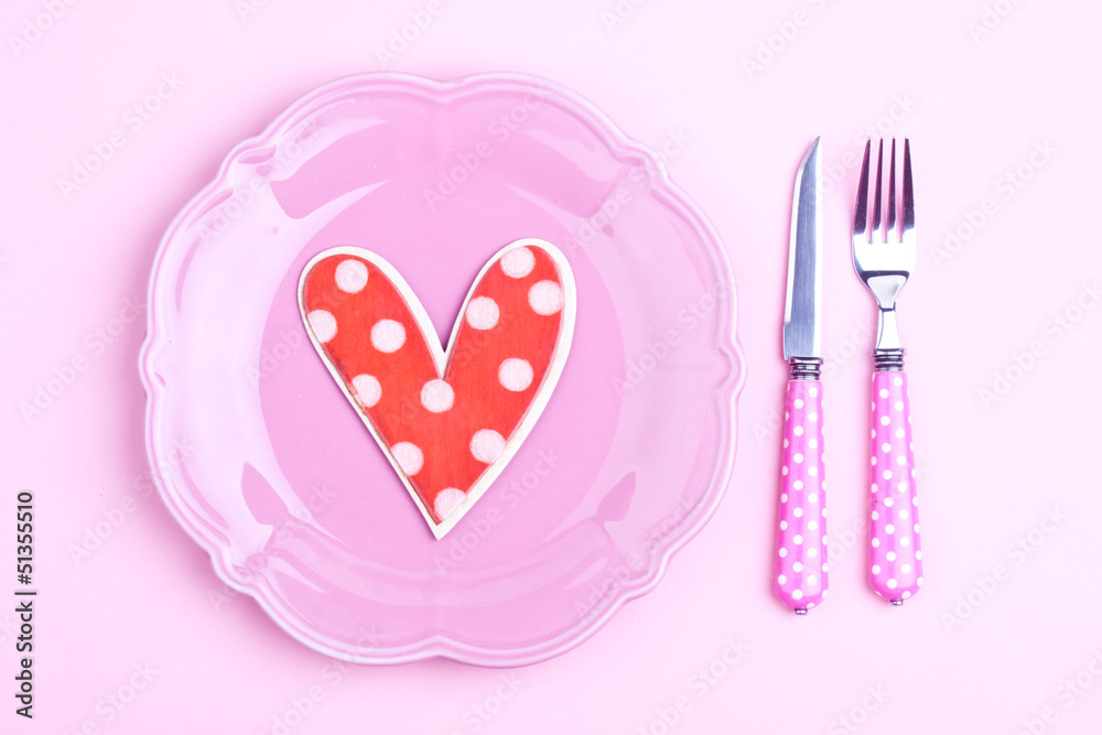heart shape on a plate and fork,knife