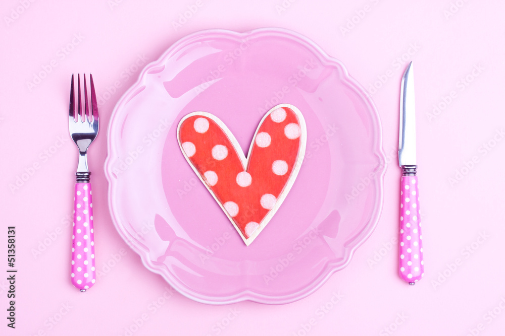 heart shape on a plate and fork,knife
