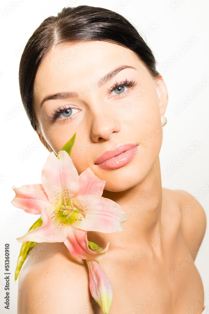Beautiful girl face & pink flowers, perfect skin & lips Beautiful girl face & pink flowers, perfect skin & lips
