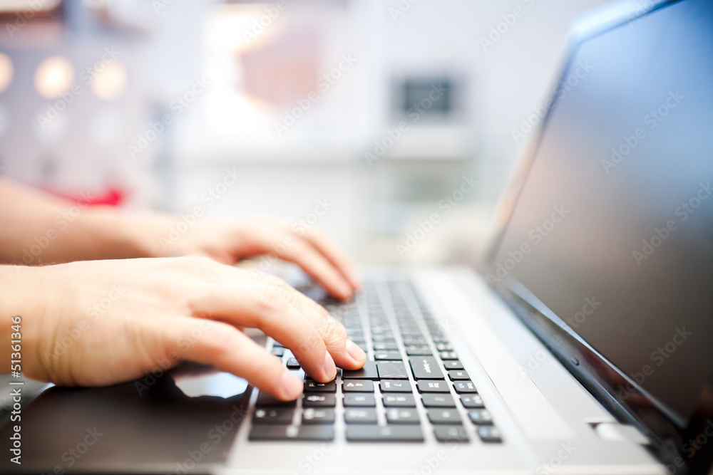 Man working on the laptop at home Man working on the laptop at home