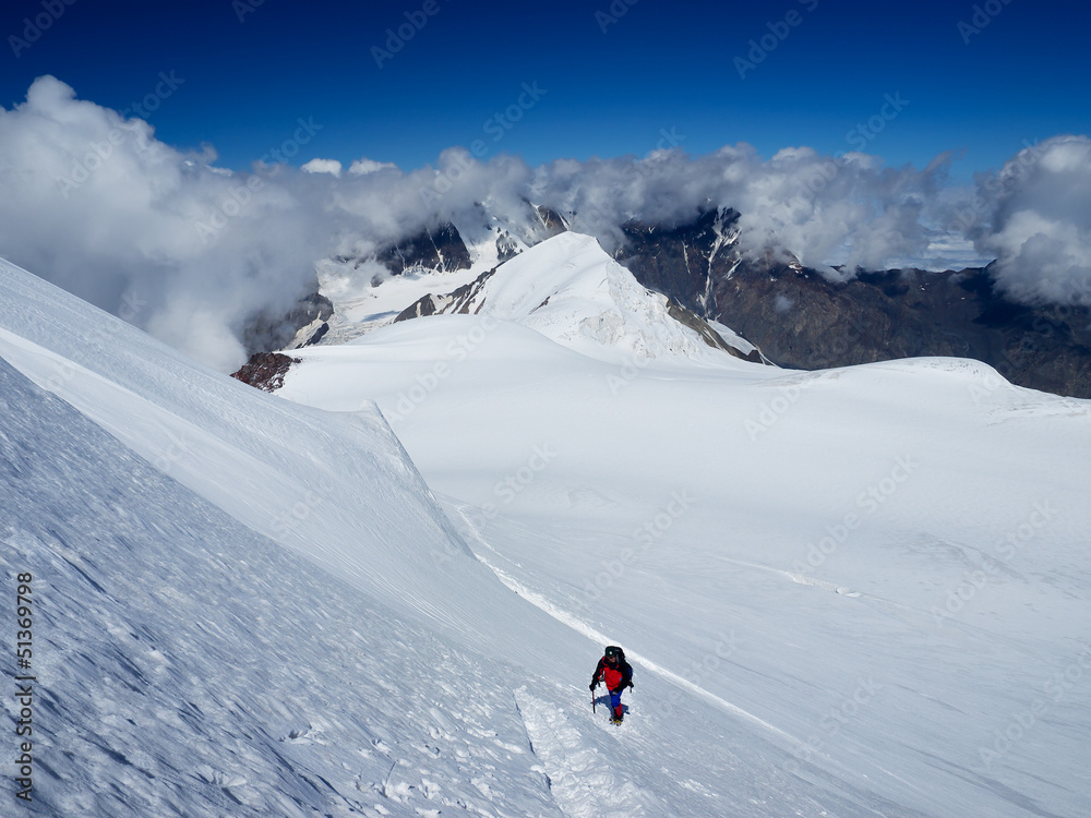 Tourist in the mountains. Sport and active life concept