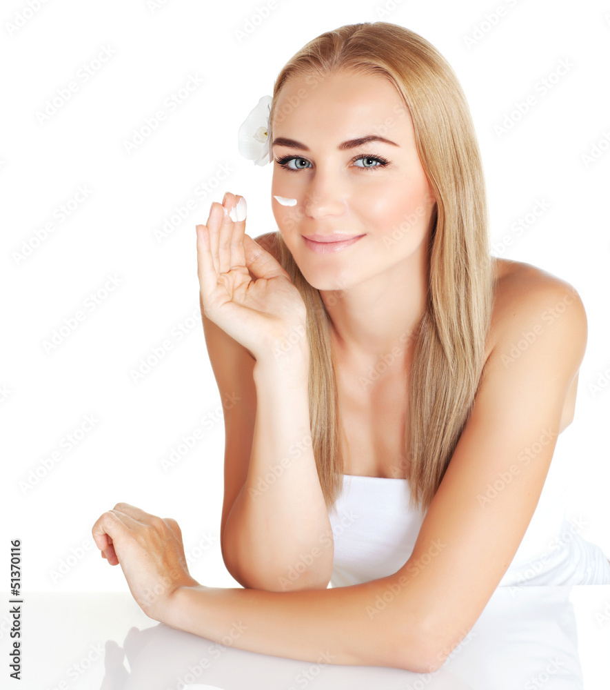 Woman apply anti wrinkle cream Woman apply anti wrinkle cream