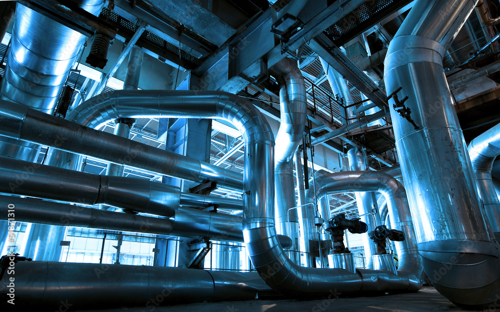Industrial zone, Steel pipelines and cables in blue tones Industrial zone, Steel pipelines and cables in blue tones
