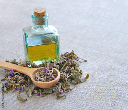 Dry herbal tea Chamerion in a wooden spoon on sackcloth
