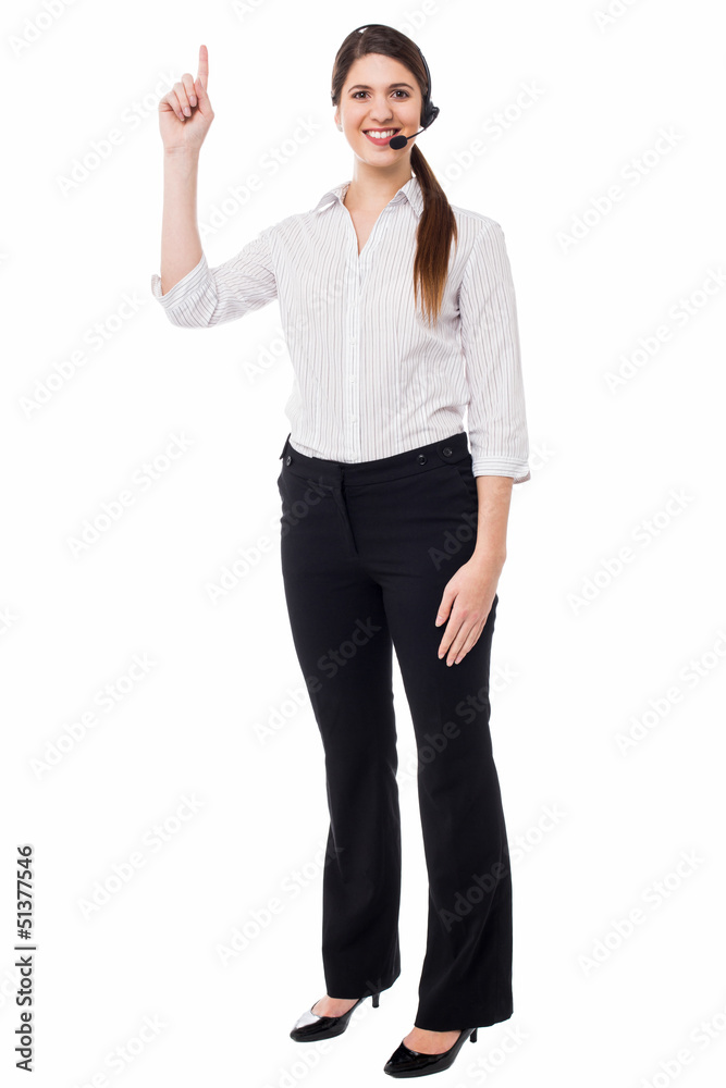 Customer support executive pointing upwards Customer support executive pointing upwards