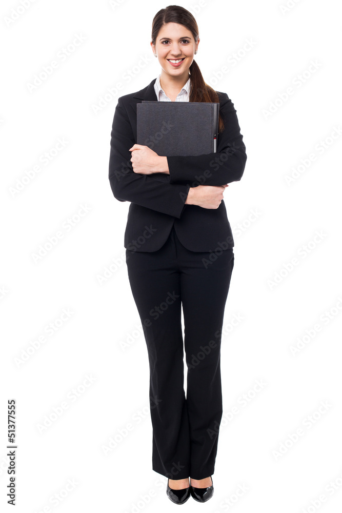 Pretty female secretary holding business files Pretty female secretary holding business files