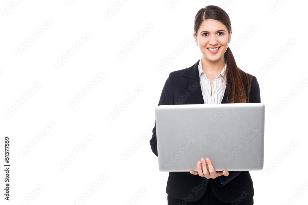Attractive woman in formals working on laptop Attractive woman in formals working on laptop