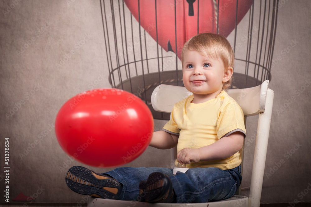 Obraz premium funny lovely baby boy little child in trendy jeans.