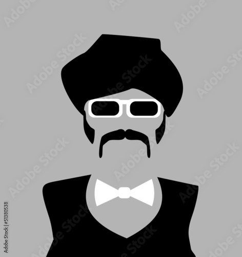 man with turban and bow tie