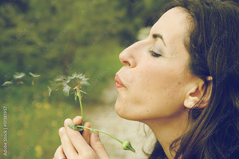 portrait young woman with dandelion portrait young woman with dandelion