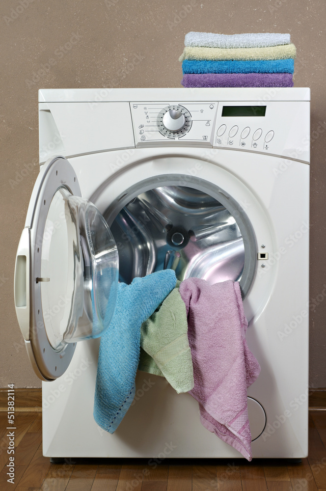 washing machine loaded with clothes washing machine loaded with clothes