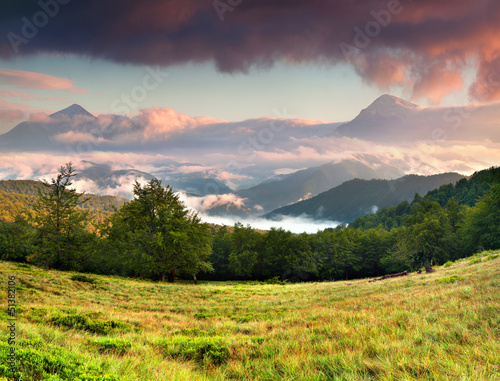 Misty sunset in the mountains at the summer © Andrew Mayovskyy