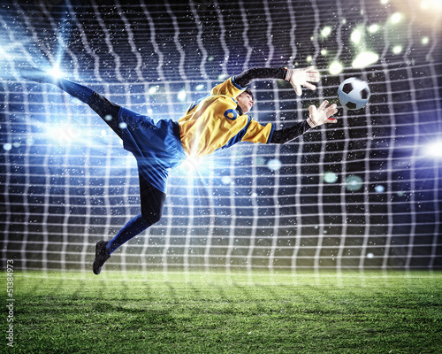 Foto Goalkeeper catches the ball