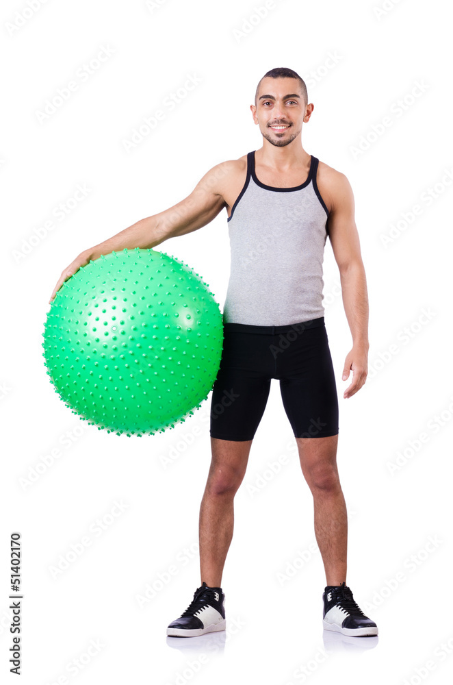 Man with swiss ball doing exercises on white Man with swiss ball doing exercises on white