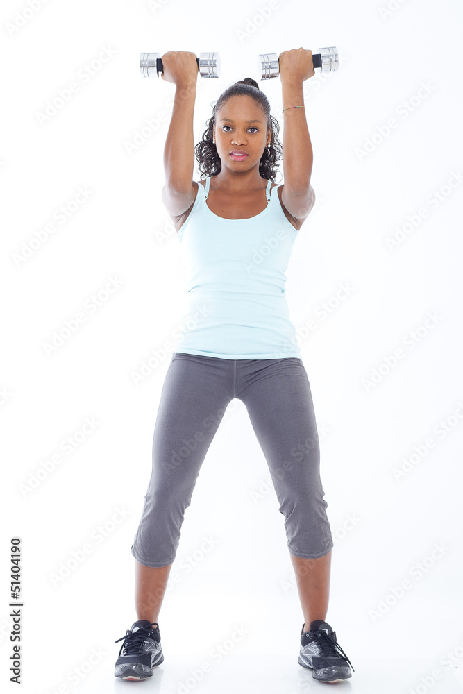 Woman working out - lifting weights Woman working out - lifting weights