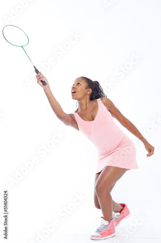 Woman playing badminton © Gold Stock Images