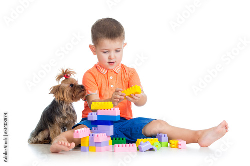 Child playing with building...
