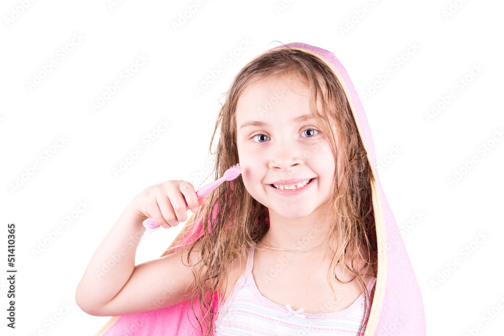 Beautiful happy smiling little girl brushing her teeth Beautiful happy smiling little girl brushing her teeth