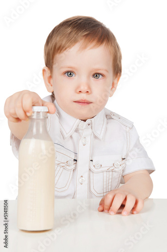 The boy with bottle of milk