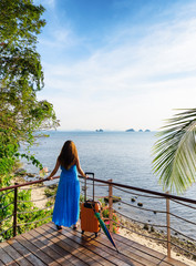 Young woman looking at the sea