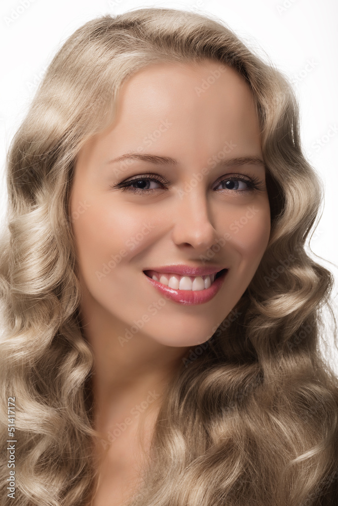 beautiful blonde girl on white background close-up