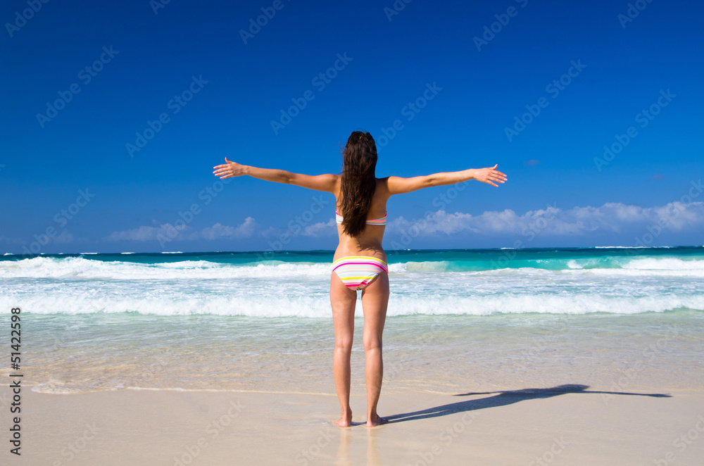 woman relaxes on the beach woman relaxes on the beach