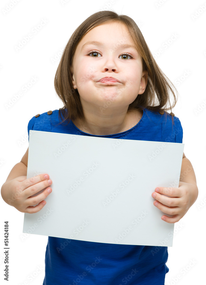 Little girl is holding blank banner Little girl is holding blank banner