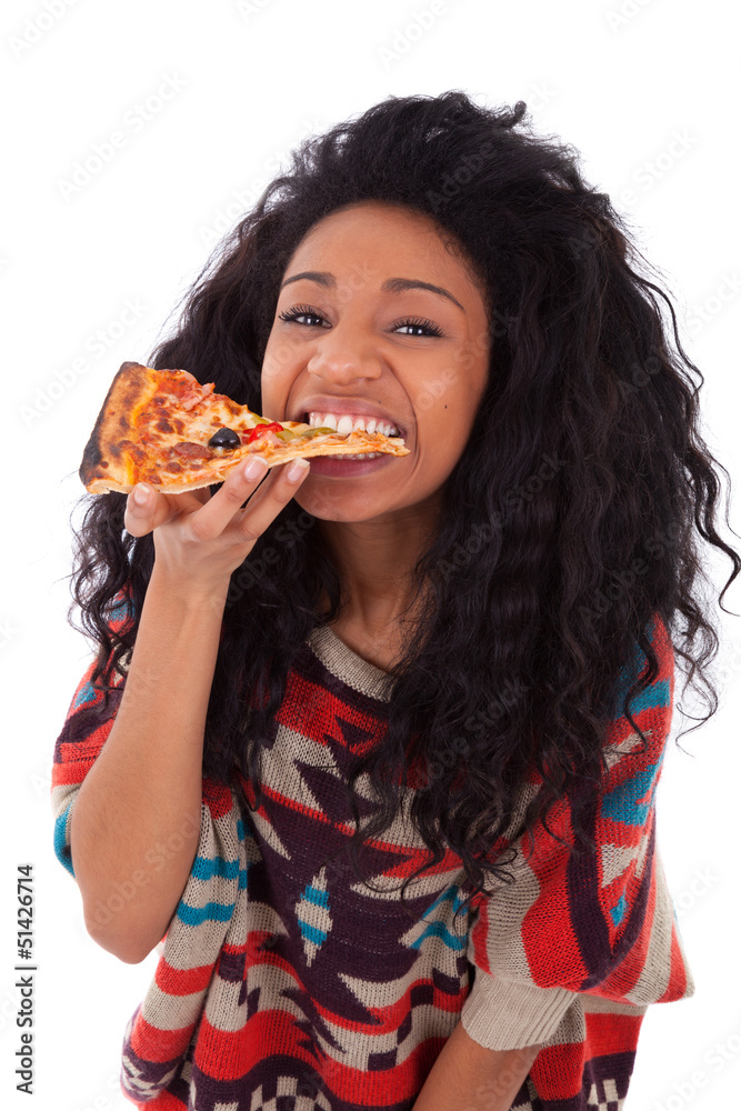 Young black african american teenage girl eating a slice of pizz Young black african american teenage girl eating a slice of pizz