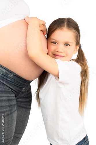 Young Girl and Her Pregnant Mom photo