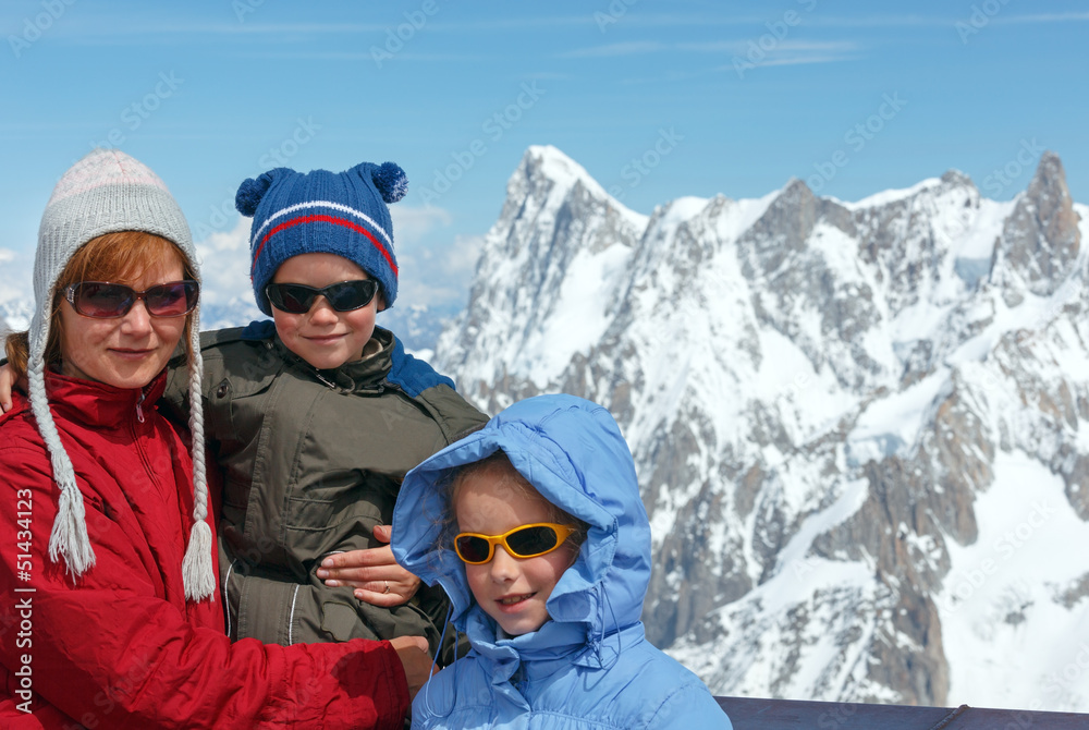 Family and Mont Blanc mountain massif behind (France ) Family and Mont Blanc mountain massif behind (France )