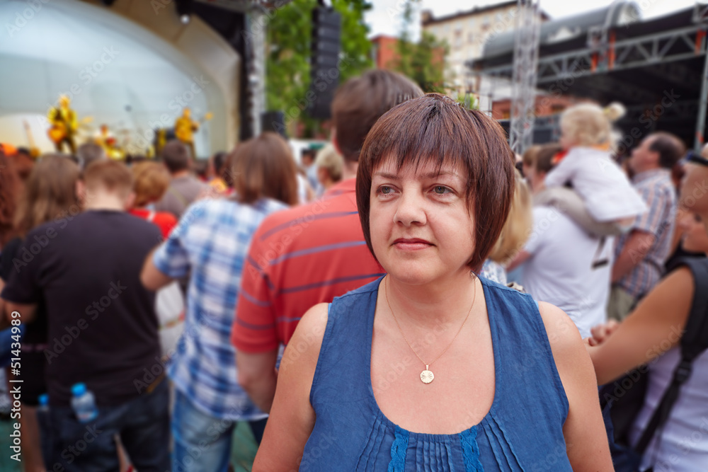 Female visitor of concert of rock-band