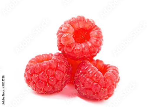Fresh raspberries isolated on white background