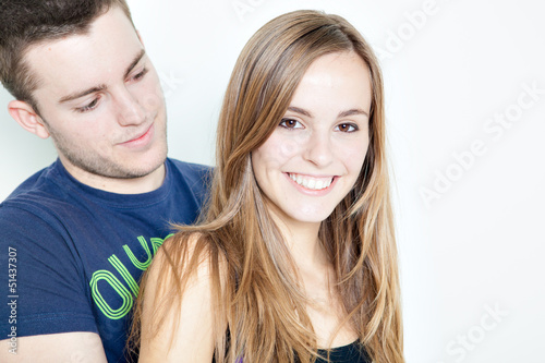 Handsome man and woman smiling at camera