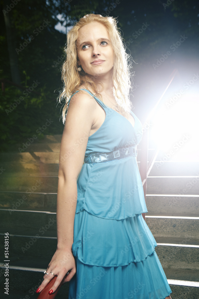 Naklejka premium Nice woman in blue apparel