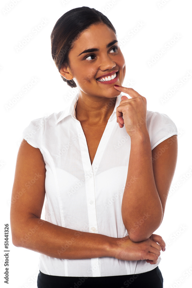 Woman thinking something and smiling Woman thinking something and smiling