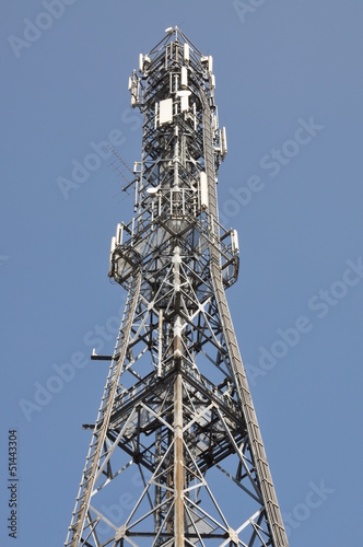 Cellphone mast against blue sky