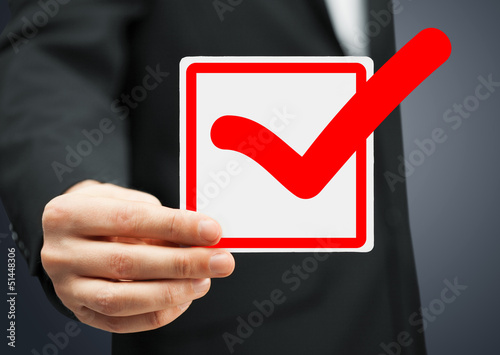 closeup of checkbox and red mark in it