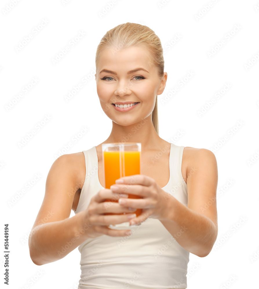woman holding glass of orange juice woman holding glass of orange juice