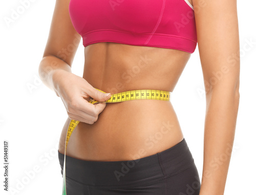 trained belly with measuring tape