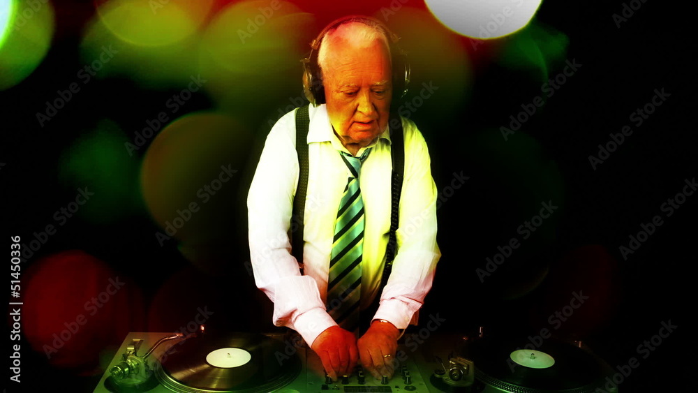 a very funky elderly grandpa dj mixing records