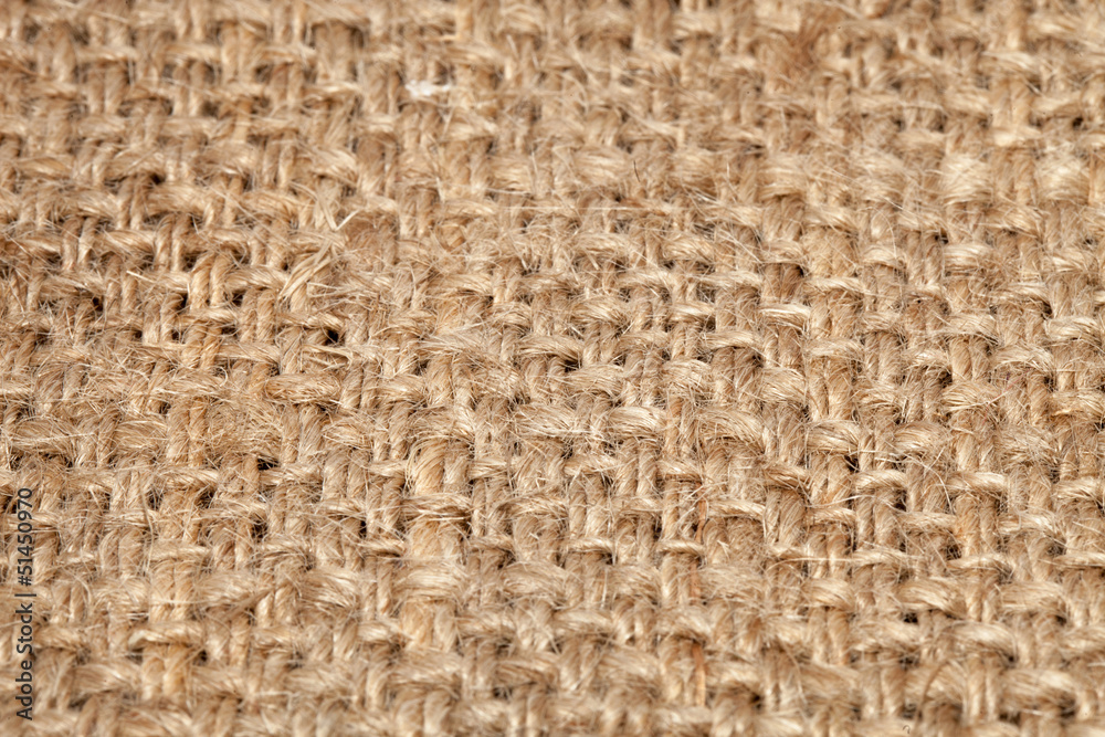 Background of burlap hessian sacking, coarse cloth made of Background of burlap hessian sacking, coarse cloth made of