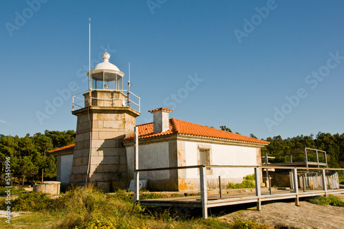 lighthouse in Punta Cabalo, Isla de Arousa, Galicia, Spain photo
